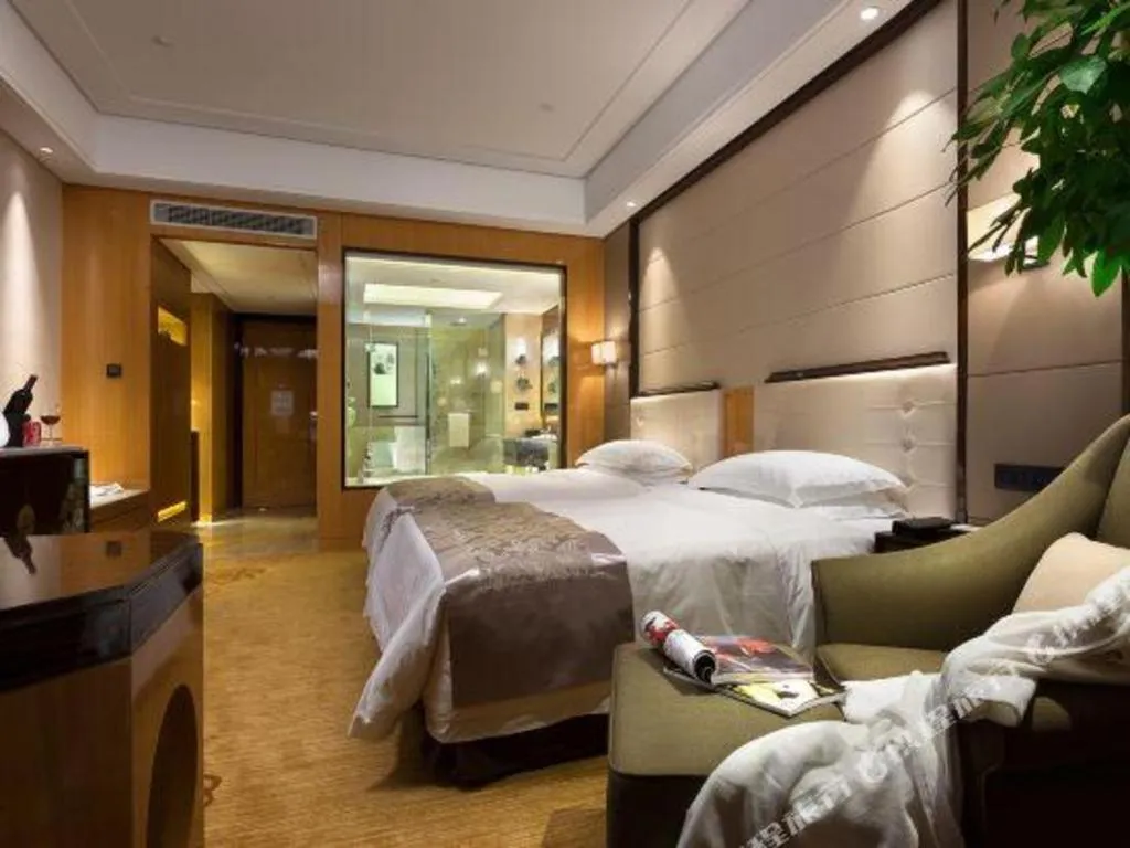Bed in Jin Jiang Mingcheng Hotel