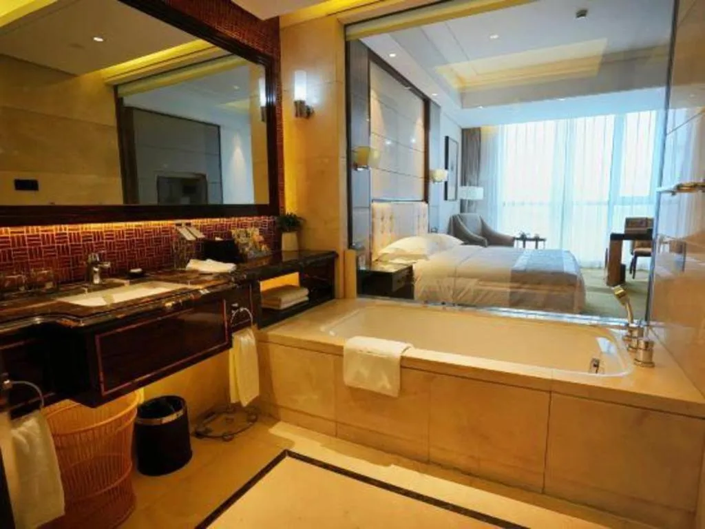 Bed in Jin Jiang Mingcheng Hotel
