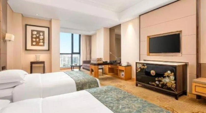 Bed in Jin Jiang Mingcheng Hotel