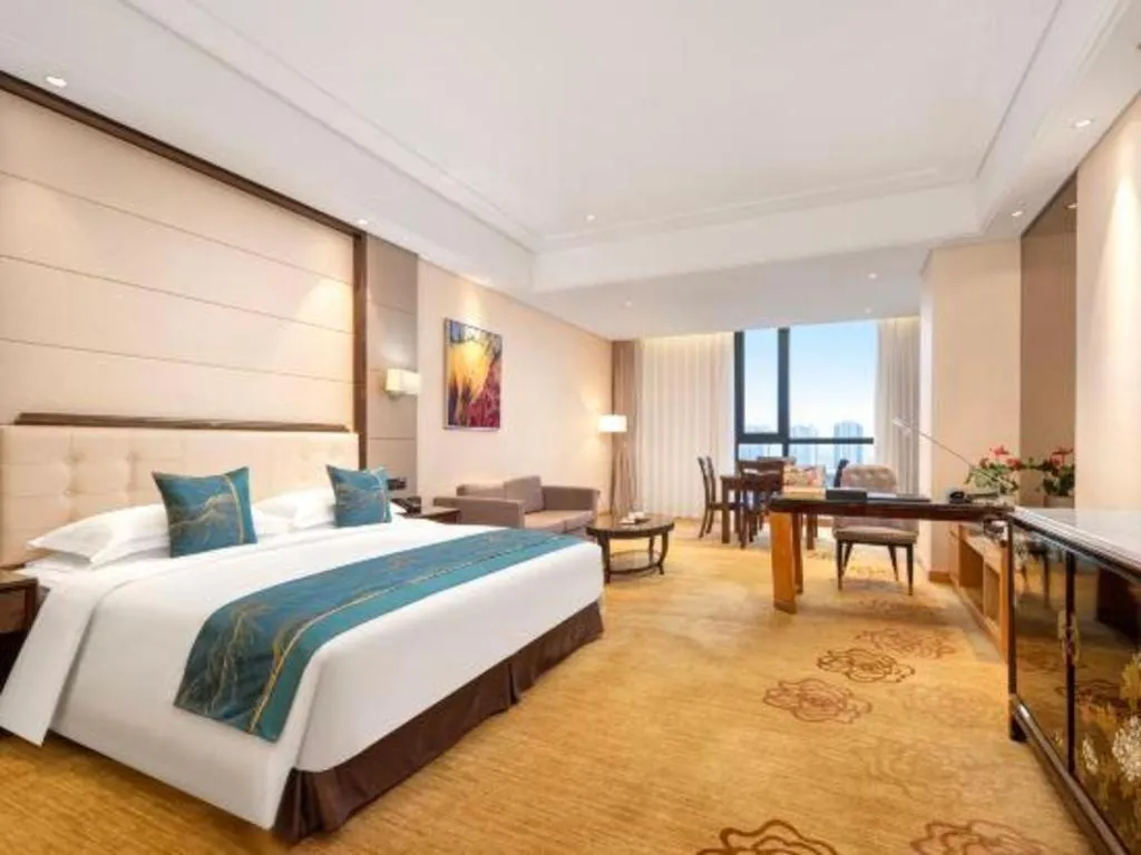 Bed in Jin Jiang Mingcheng Hotel