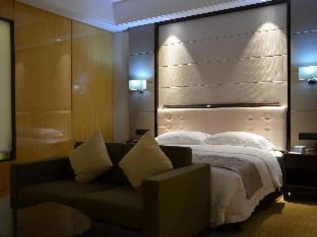 Bed in Jin Jiang Mingcheng Hotel