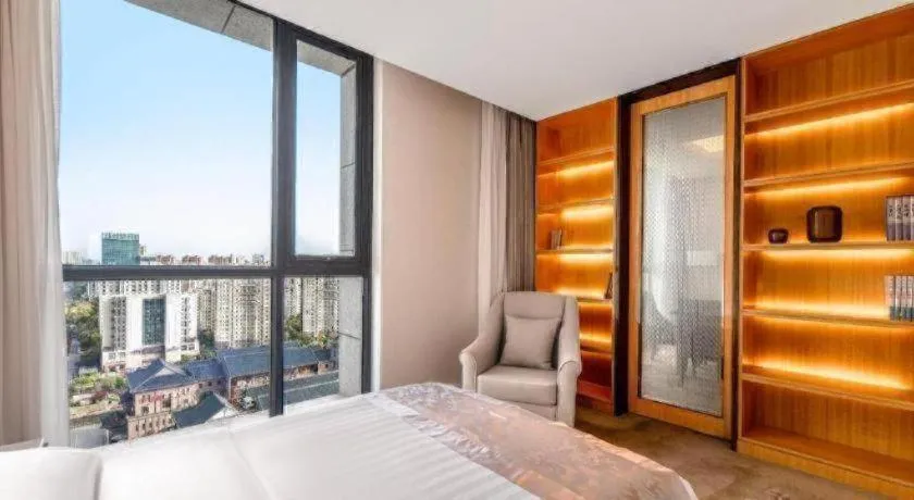 Bed in Jin Jiang Mingcheng Hotel