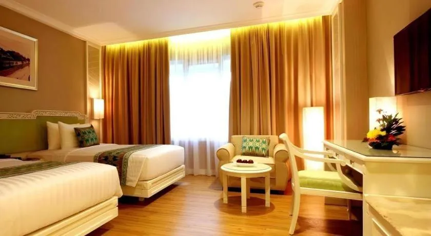 Bed in Kartika Chandra Hotel