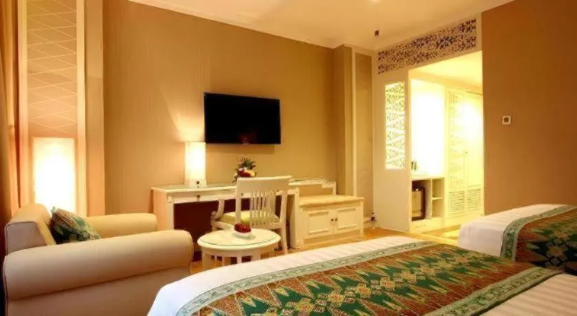 Bed in Kartika Chandra Hotel