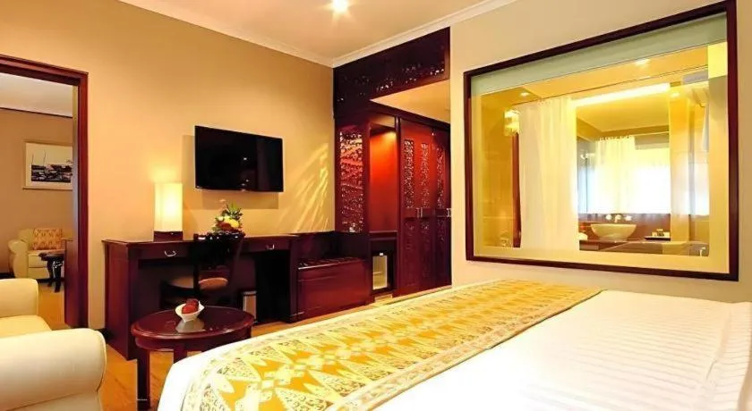 Bed in Kartika Chandra Hotel