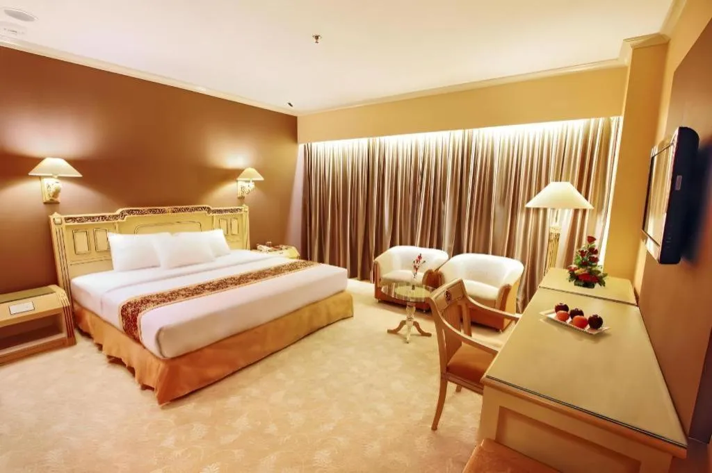 Bed in Kartika Chandra Hotel