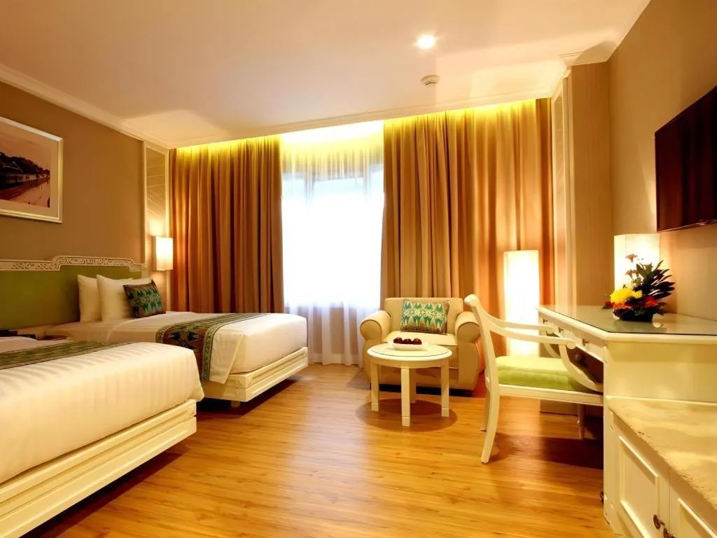 Bed in Kartika Chandra Hotel