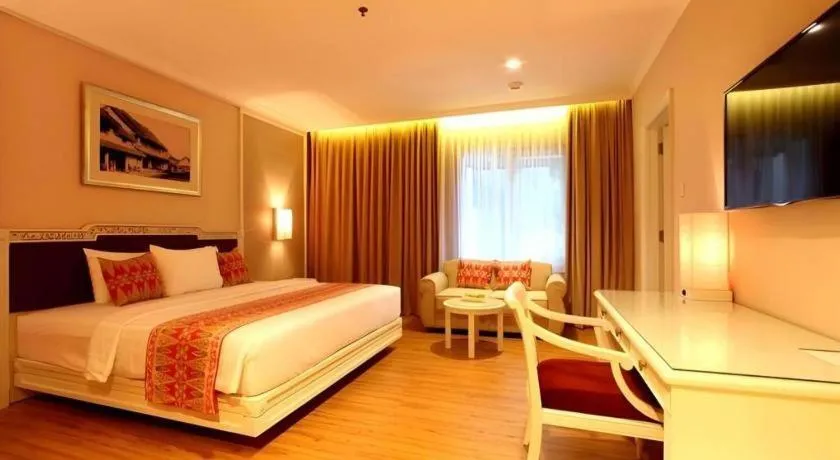 Bed in Kartika Chandra Hotel