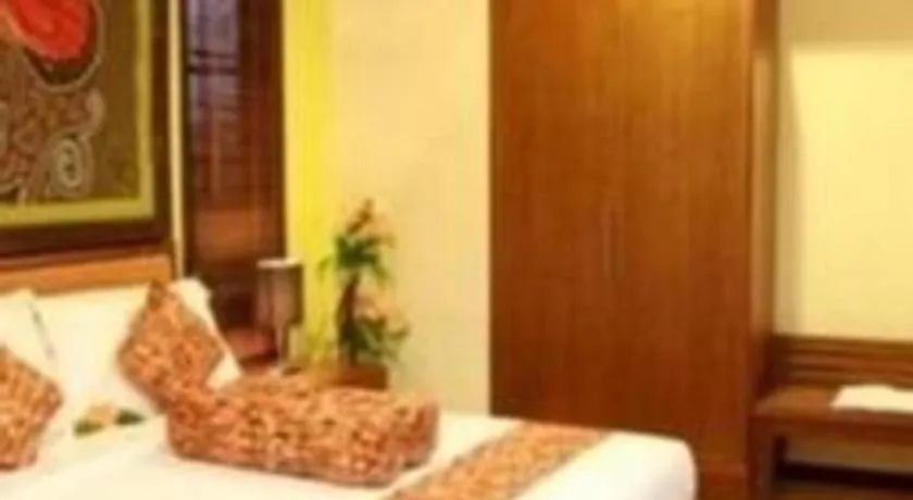 Bed in The Luxio Hotel