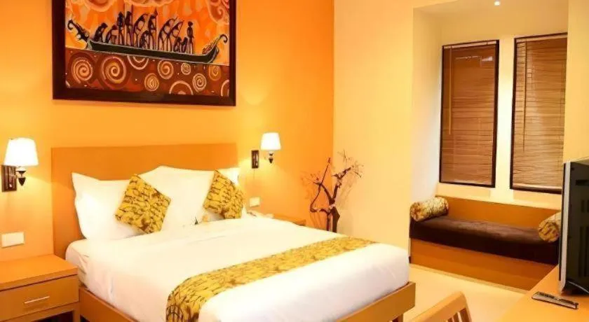 Bed in The Luxio Hotel