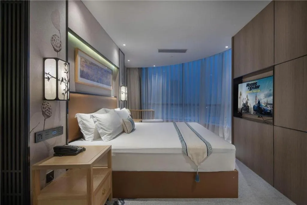 Bed in Yuan Culture Hotel Shenzhen World Shajing
