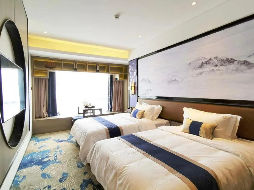 Bed in Yuan Culture Hotel Shenzhen World Shajing