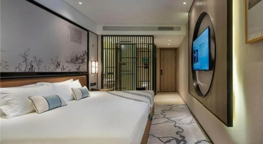 Bed in Yuan Culture Hotel Shenzhen World Shajing