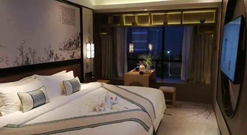 Bed in Yuan Culture Hotel Shenzhen World Shajing
