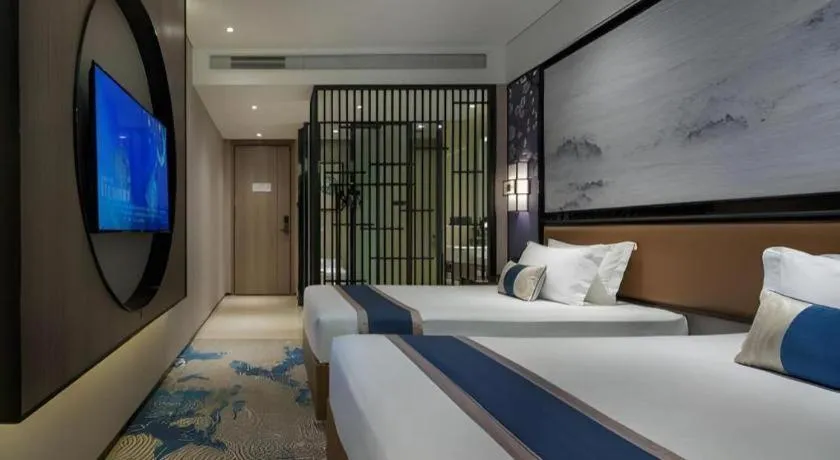 Bed in Yuan Culture Hotel Shenzhen World Shajing
