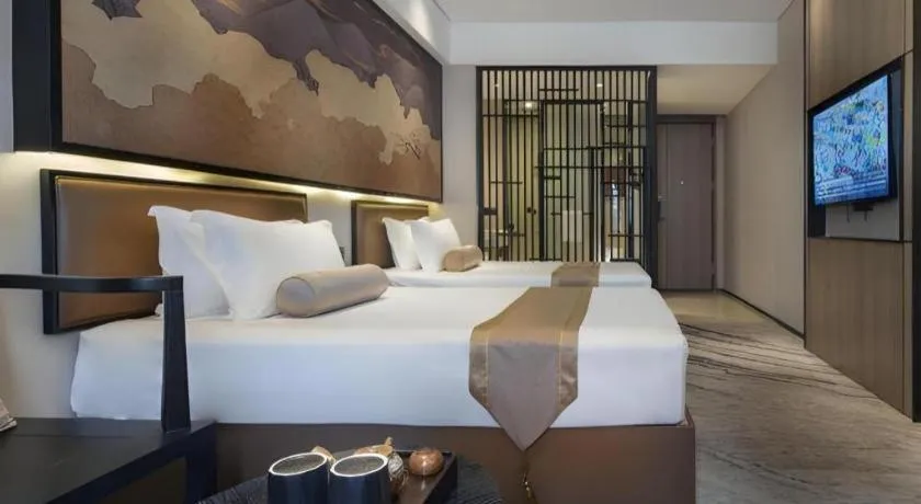 Bed in Yuan Culture Hotel Shenzhen World Shajing