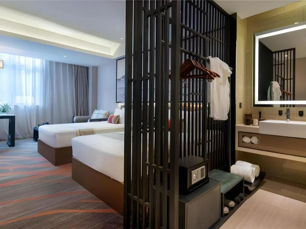 Bed in Yuan Culture Hotel Shenzhen World Shajing