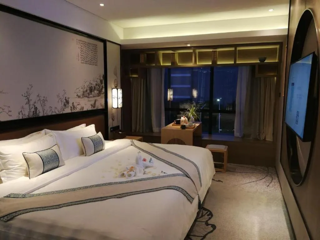 Bed in Yuan Culture Hotel Shenzhen World Shajing