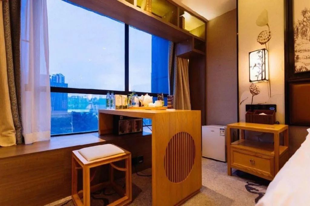 Bed in Yuan Culture Hotel Shenzhen World Shajing