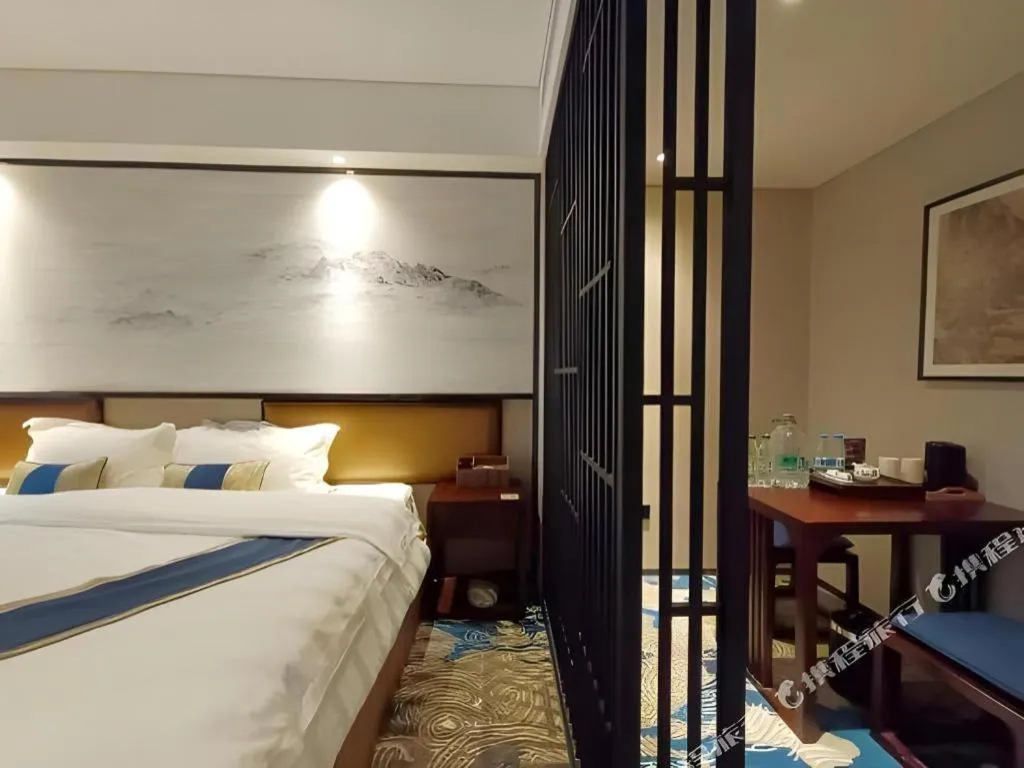 Bed in Yuan Culture Hotel Shenzhen World Shajing