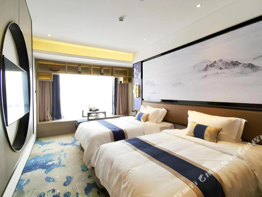 Bed in Yuan Culture Hotel Shenzhen World Shajing