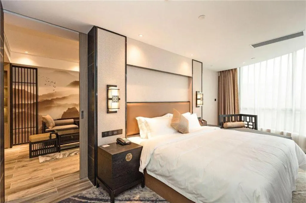 Bed in Yuan Culture Hotel Shenzhen World Shajing