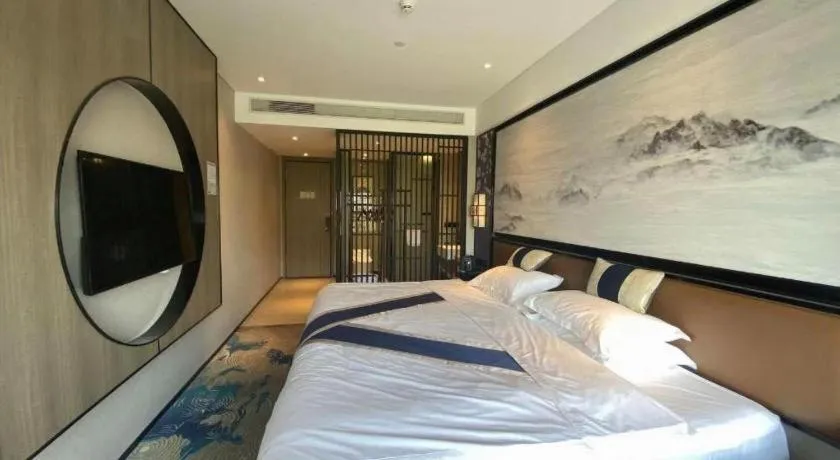 Bed in Yuan Culture Hotel Shenzhen World Shajing