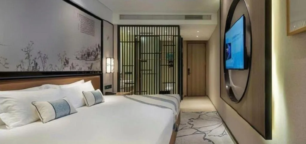 Bed in Yuan Culture Hotel Shenzhen World Shajing