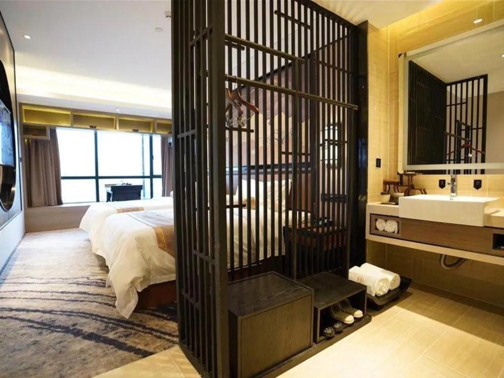 Bed in Yuan Culture Hotel Shenzhen World Shajing