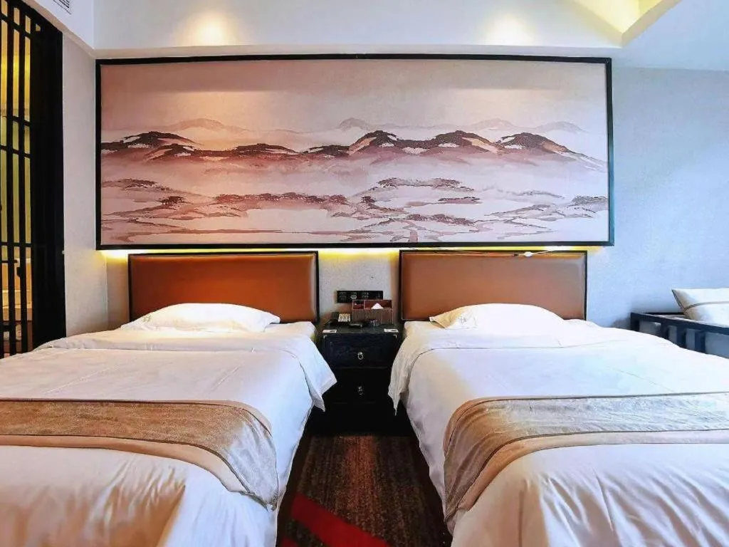 Bed in Yuan Culture Hotel Shenzhen World Shajing