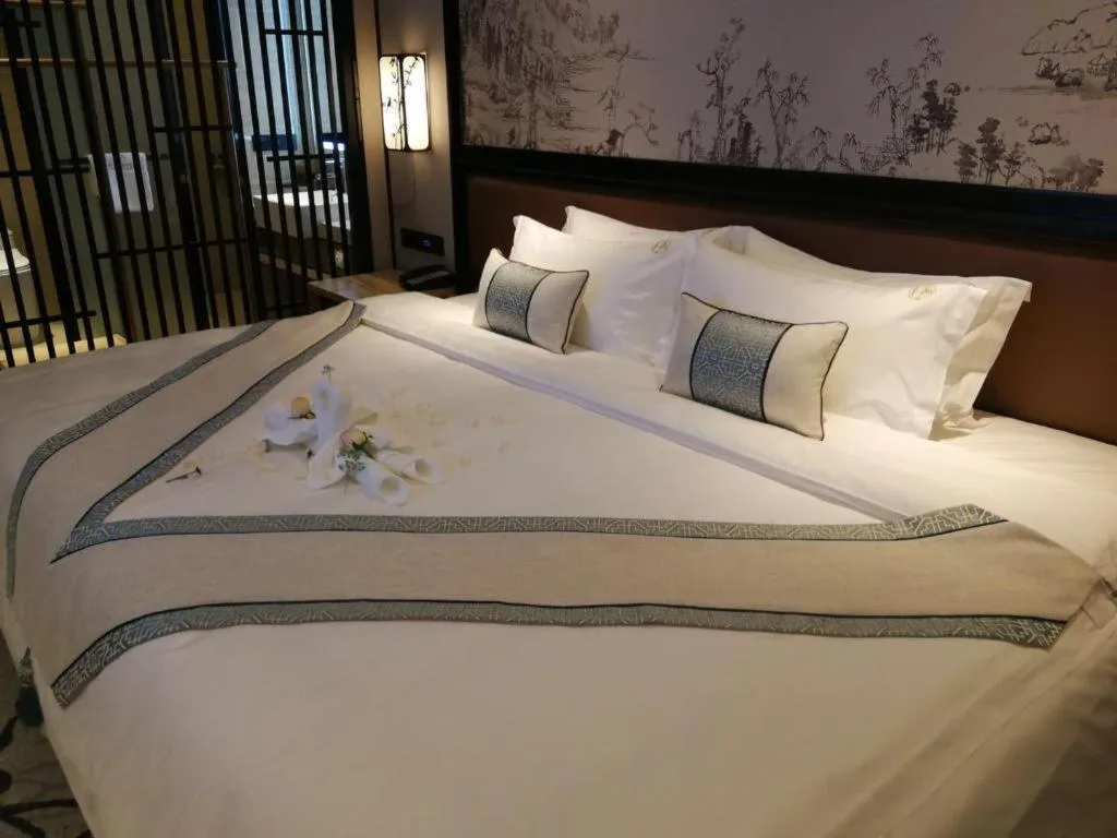 Bed in Yuan Culture Hotel Shenzhen World Shajing