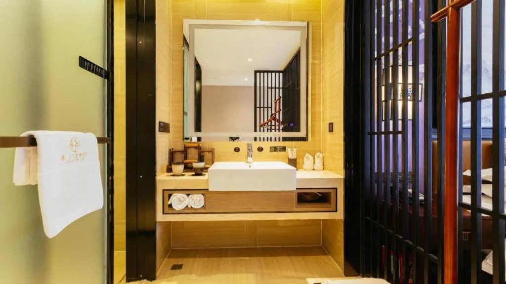 Bed in Yuan Culture Hotel Shenzhen World Shajing