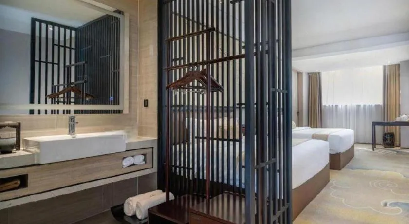 Bed in Yuan Culture Hotel Shenzhen World Shajing