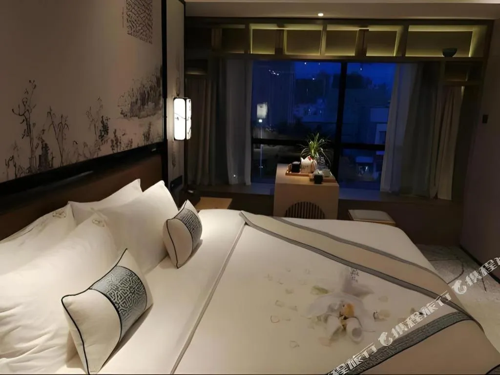 Bed in Yuan Culture Hotel Shenzhen World Shajing