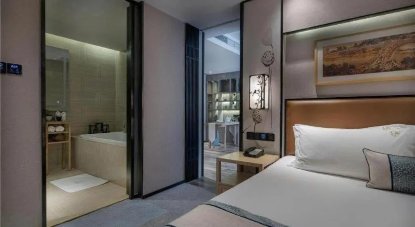 Bed in Yuan Culture Hotel Shenzhen World Shajing