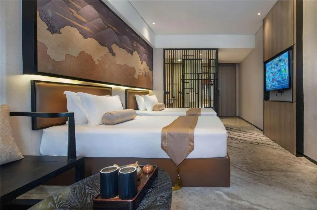 Bed in Yuan Culture Hotel Shenzhen World Shajing