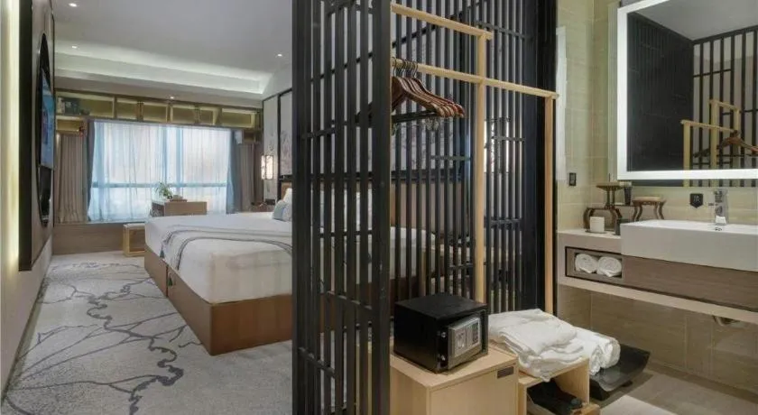 Bed in Yuan Culture Hotel Shenzhen World Shajing