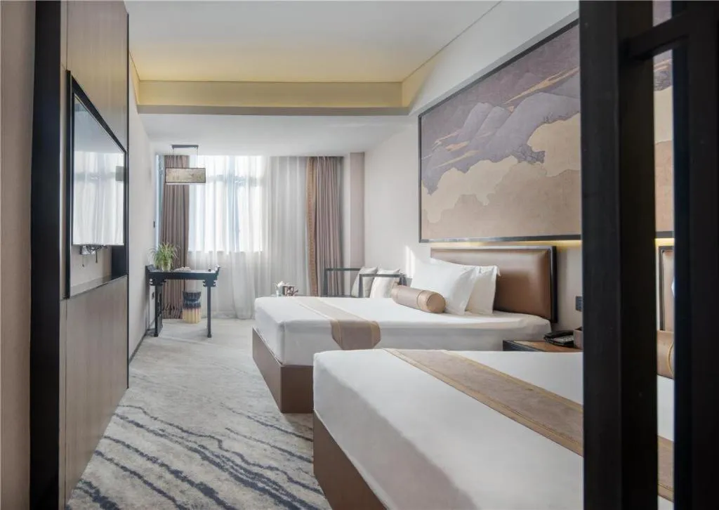 Bed in Yuan Culture Hotel Shenzhen World Shajing