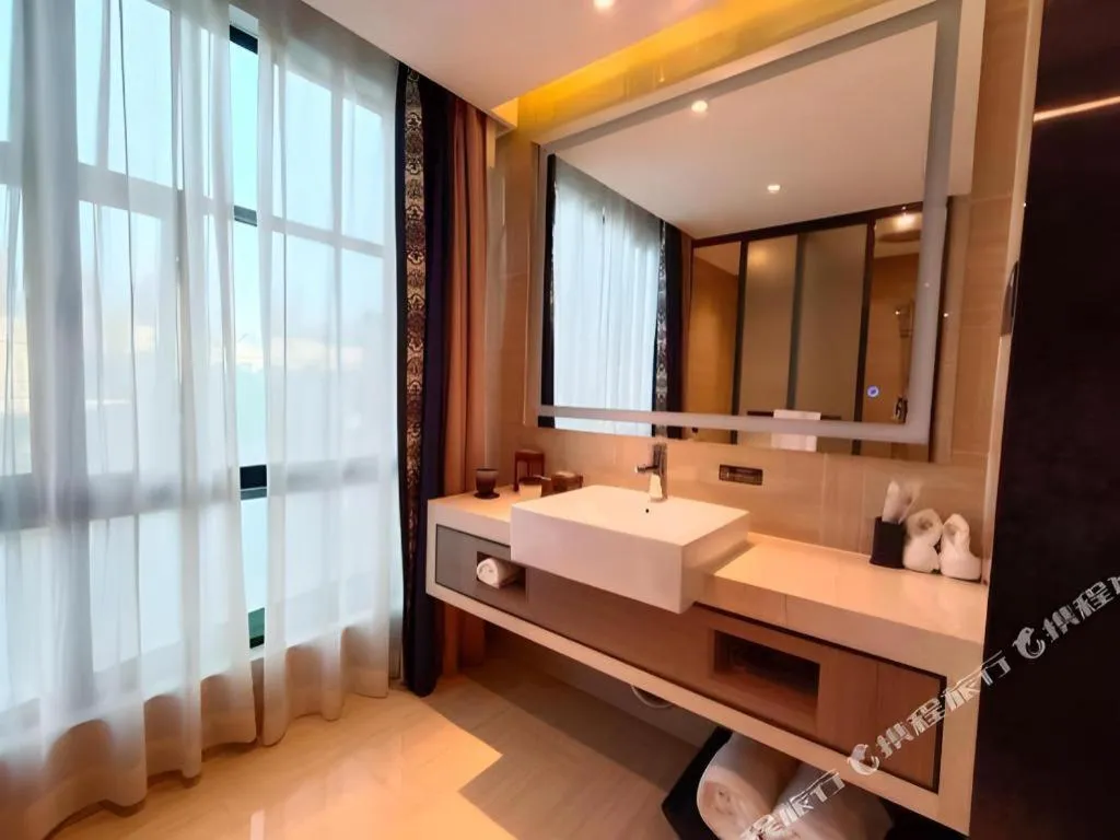 Bed in Yuan Culture Hotel Shenzhen World Shajing