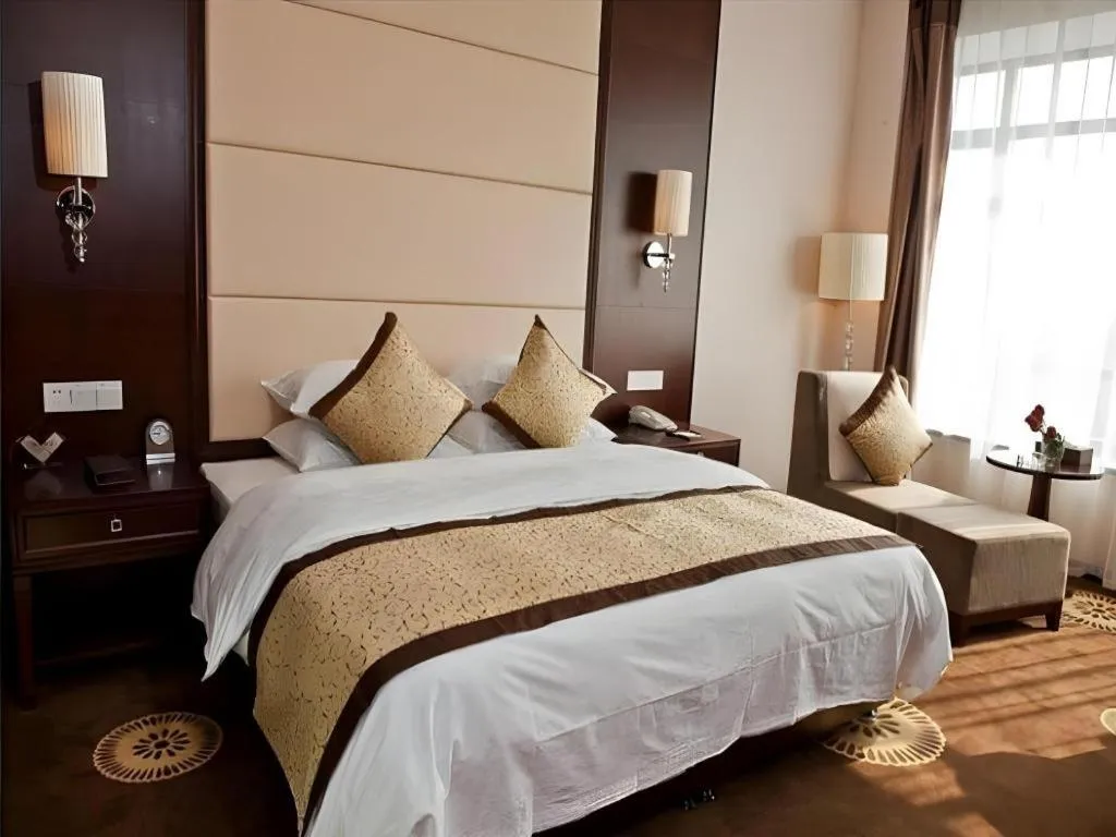 Bed in Hotel Ramada Plaza Hangzhou Xiaoshan