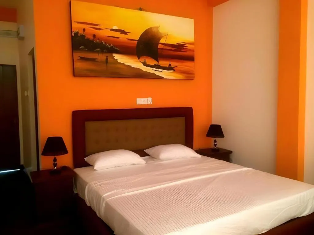 Bed in Bridge Hotel Negombo