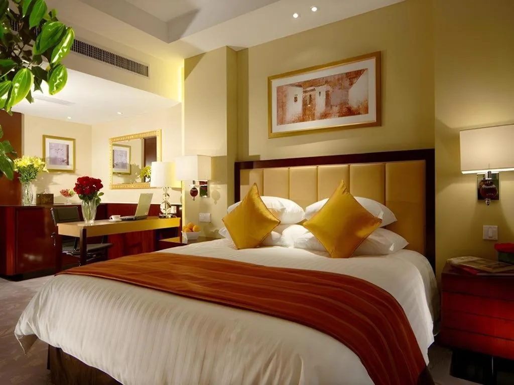 Bed in New Century Shaoxing Grand Hotel
