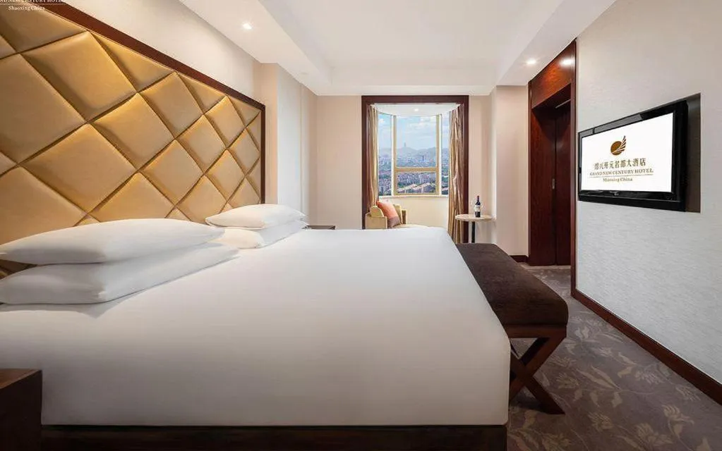 Bed in New Century Shaoxing Grand Hotel