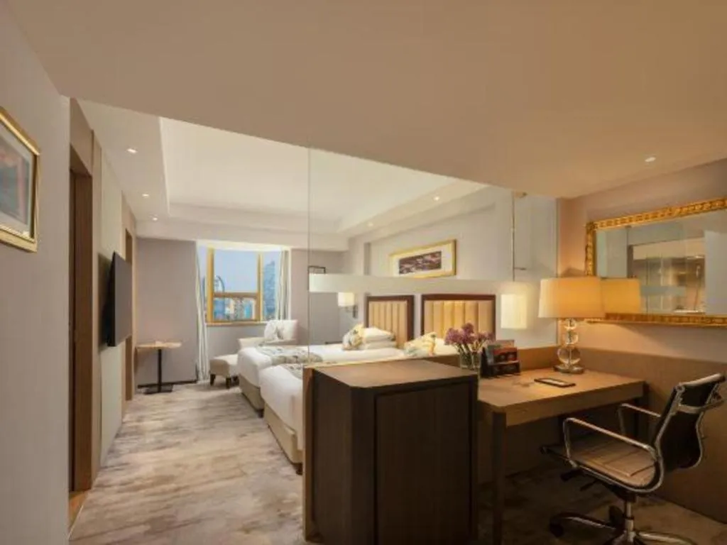 Bed in New Century Shaoxing Grand Hotel