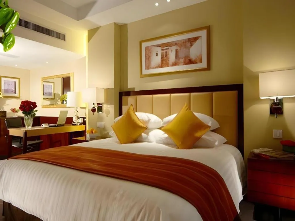 Bed in New Century Shaoxing Grand Hotel