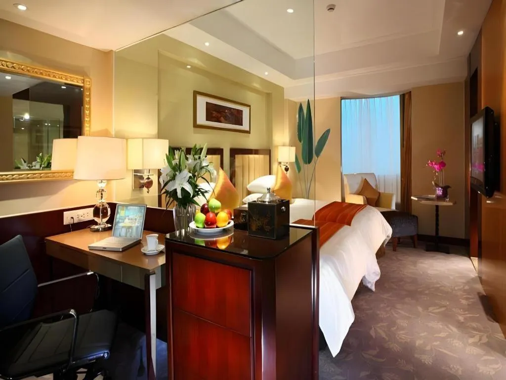 Bed in New Century Shaoxing Grand Hotel