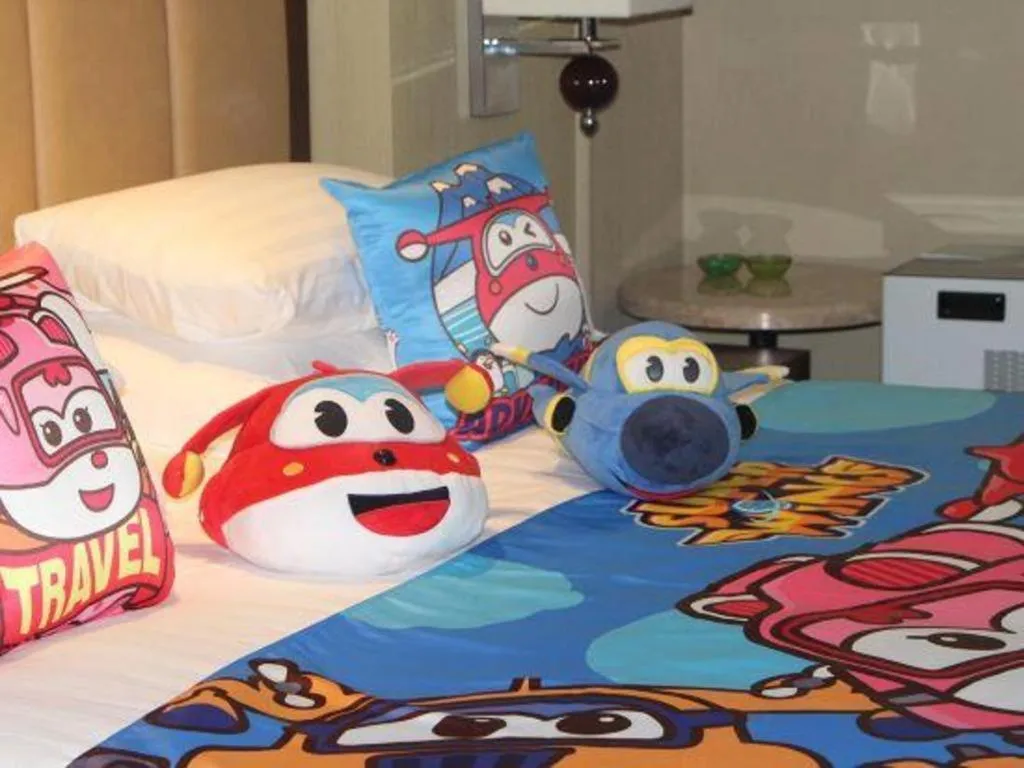 Bed in New Century Shaoxing Grand Hotel