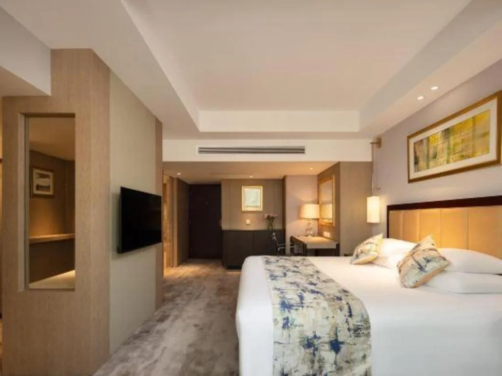 Bed in New Century Shaoxing Grand Hotel