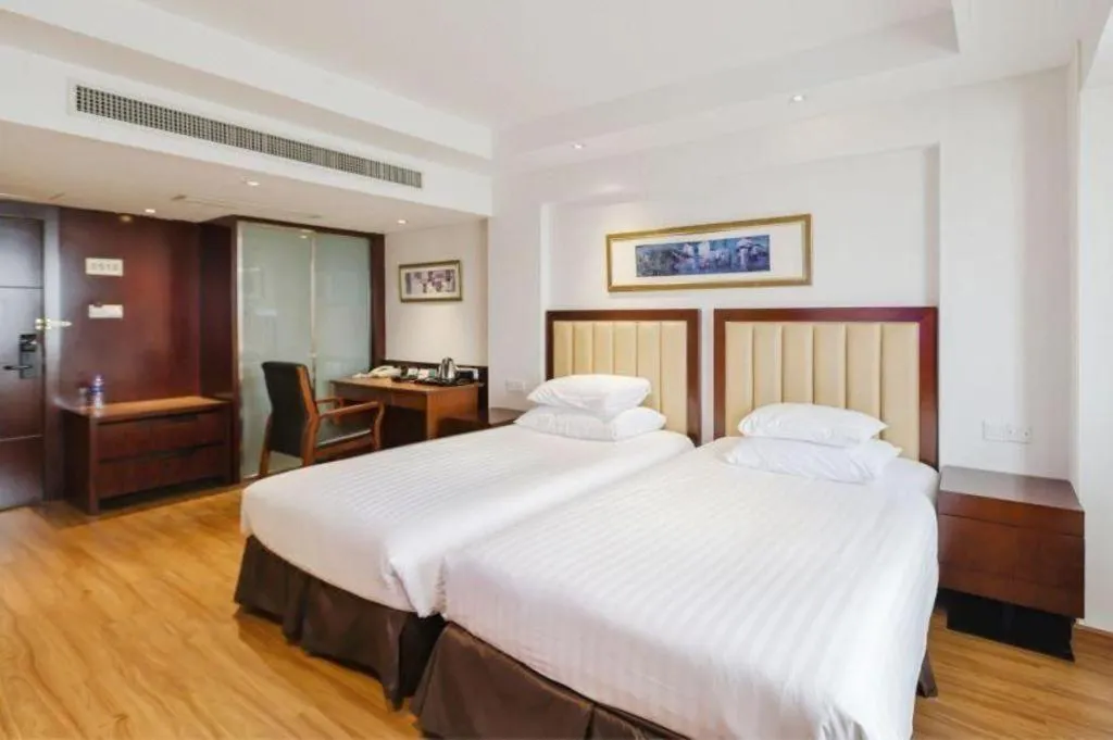 Bed in New Century Shaoxing Grand Hotel