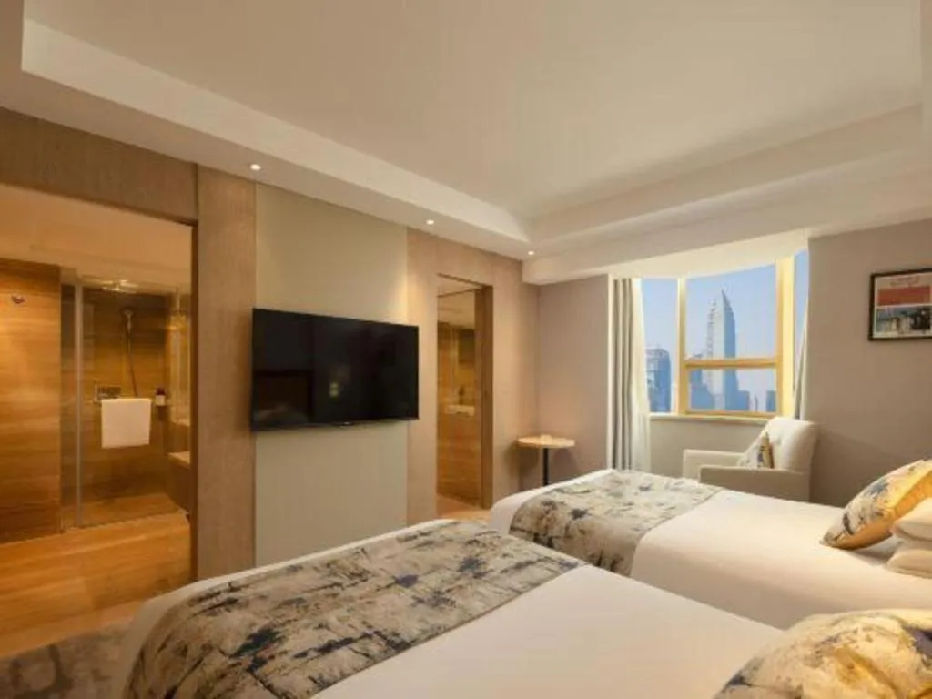 Bed in New Century Shaoxing Grand Hotel